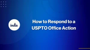 Blue background with the indie logo on the left and the text How to Respond to a USPTO Office Action in bold white letters on the right.