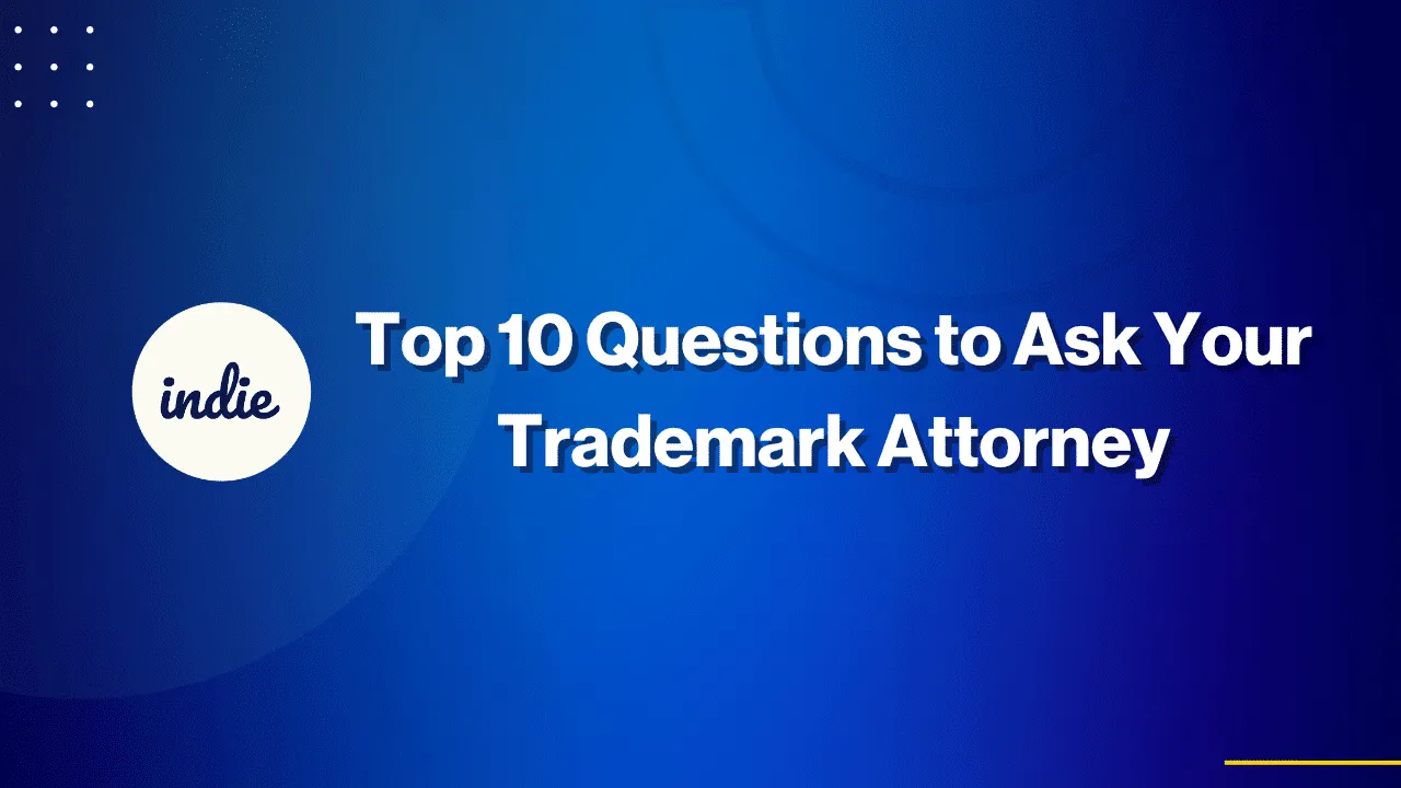 Blue graphic with the text “Top 10 Questions to Ask Your Trademark Attorney” in white. A white circle on the left contains the word “indie” in cursive. Subtle circular designs appear in the background.