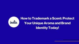 Blue background with the word indie in a white circle on the left and bold white text saying How to Trademark a Scent: Protect Your Unique Aroma and Brand Identity Today! on the right. Thin yellow and black lines at the bottom right.