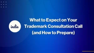 White text on a blue background reads “What to Expect on Your Trademark Consultation Call (and How to Prepare).” The indie logo appears on the left.