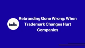 Blue graphic with a white circle containing the word indie on the left. Bold white text in the center reads: Rebranding Gone Wrong: When Trademark Changes Hurt Companies. Thin yellow and blue lines are at the bottom right.