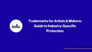 A blue slide with a white circle on the left containing the word indie. To the right, bold white text reads, Trademarks for Artists & Makers: Guide to Industry-Specific Protection. Thin yellow and purple lines are at the bottom right.