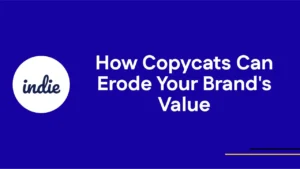 Blue background with the word indie in a white circle on the left. Next to it, white text reads: How Copycats Can Erode Your Brands Value. Thin yellow and purple lines are in the lower right corner.