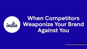 A blue background with the indie logo on the left and white text on the right that reads: When Competitors Weaponize Your Brand Against You. Thin yellow and white lines are at the bottom right corner.