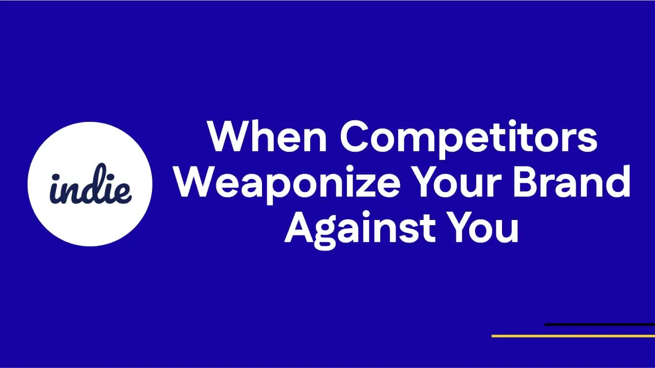 A blue background with the indie logo on the left and white text on the right that reads: When Competitors Weaponize Your Brand Against You. Thin yellow and white lines are at the bottom right corner.