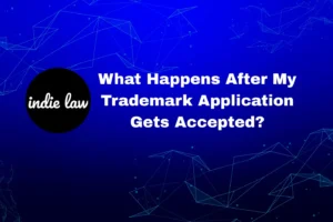 Blue background with geometric lines, black circle with "indie law" text, and large white text reading, "Trademark Application Approved: Next Steps.