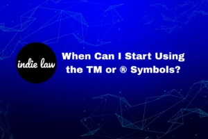 A blue background with geometric lines, the indie law logo, and the text: "When Can I Start Using the TM or ® Symbols? Trademark application approved—discover your next steps.