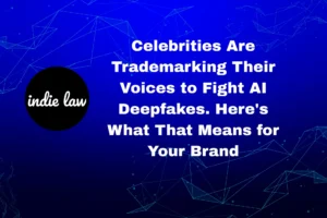 Blue graphic with white text reading "Celebrities Are Trademarking Their Voices to Fight AI Deepfakes. Here's What That Means for Your Brand" and an indie law logo on the left.