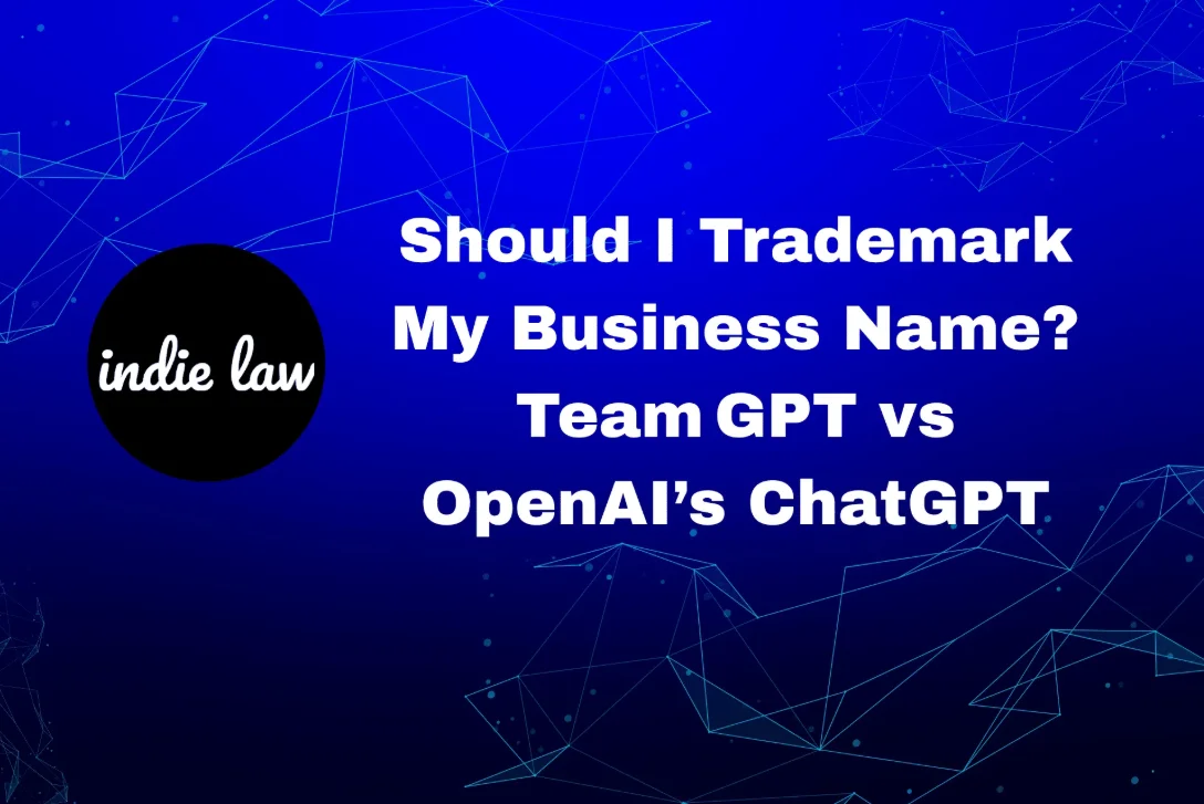 A graphic with the indie law logo and the text: "Should I Trademark My Business Name? Team GPT vs OpenAI’s ChatGPT" on a blue digital background, highlighting key trademark limits businesses should consider.