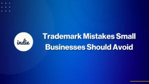 A blue background with a white circle on the left containing the word indie, and bold white text reading Trademark Mistakes Small Businesses Should Avoid.