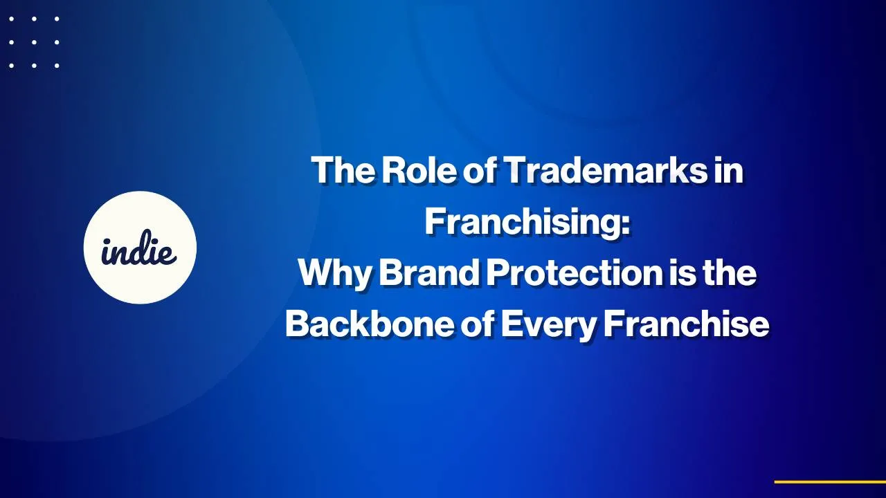 Blue background with white text that reads, The Role of Trademarks in Franchising: Why Brand Protection is the Backbone of Every Franchise. A circle with indie written inside is on the left.