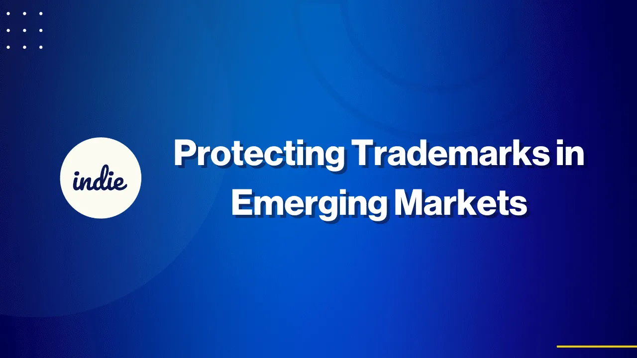 Blue slide with indie in a white circle on the left and bold white text in the center reading Protecting Trademarks in Emerging Markets. Subtle circular patterns and dotted design appear in the background.