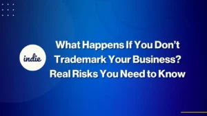 Blue background graphic with the text: What Happens If You Don’t Trademark Your Business? Real Risks You Need to Know. Includes a white circle with the word indie on the left side.